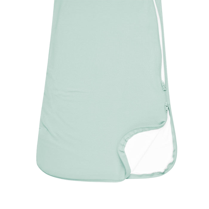 Close up of unzipped double zipper on Kyte Baby Sleep Bag in Sage 0.5 TOG