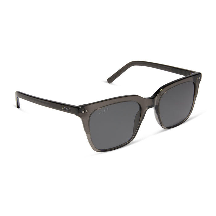 diff eyewear featuring the billie xl square sunglasses with a black smoke crystal frame and grey polarized lenses angled view