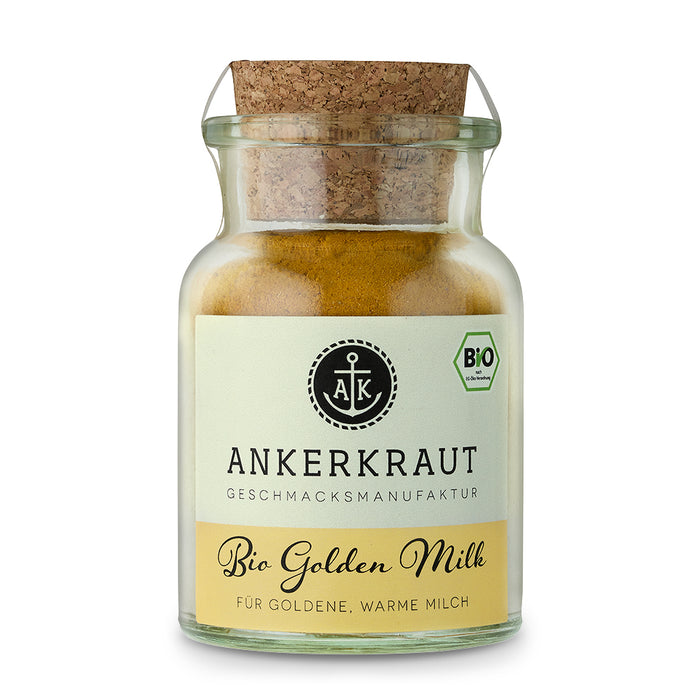 Bio Goldene Milch von Ankerkraut im Korkenglas auf weißem Hintergrund.