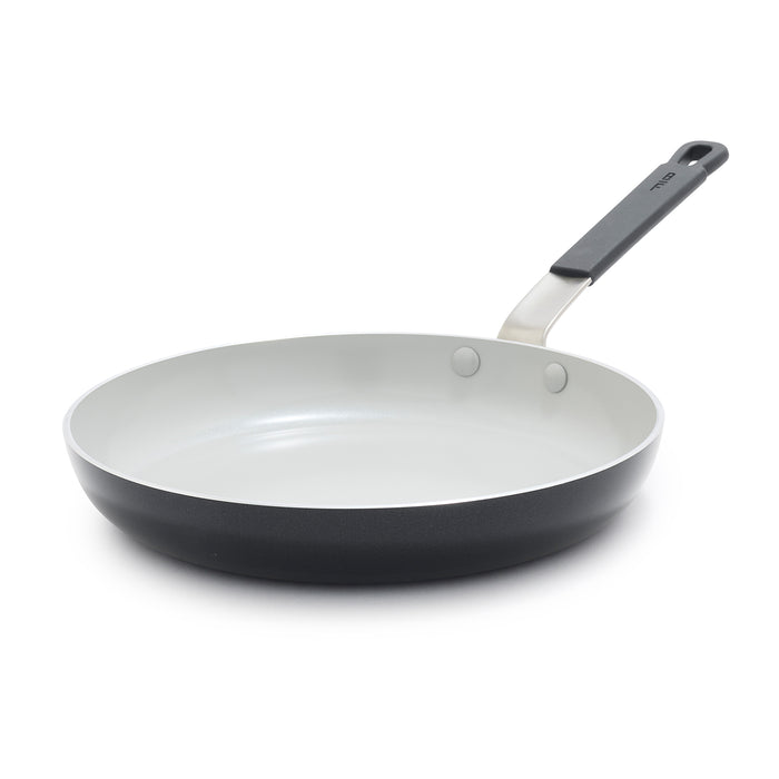 Black ceramic nonstick frypan with long handle and light interior, Bobby Flay by GreenPan, 10-inch size.