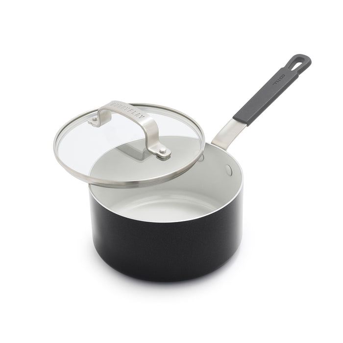 Graphite saucepan with glass lid and long handle on white background, 1.6-quart size.