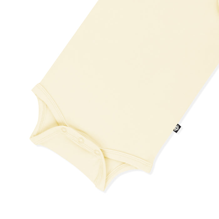 Close up of the snap closures on the Bodysuit in Chamomile