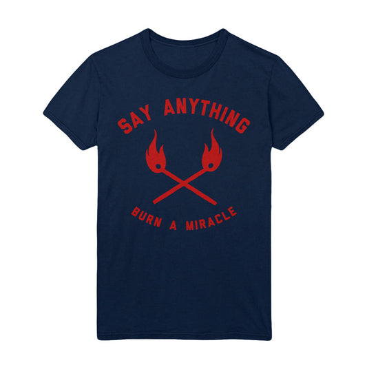 Navy blue Say Anything "Burn A Miracle" T-shirt featuring two crossed red torches at the center, with "SAY ANYTHING" above and "BURN A MIRACLE" below in bold red letters.