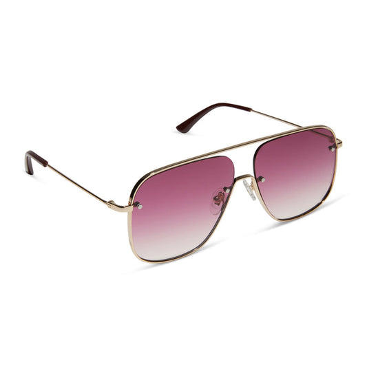 iconica featuring the cynthia navigator sunglasses with a gold with bordeaux temple tips frame and wine gradient polarized lenses angled view