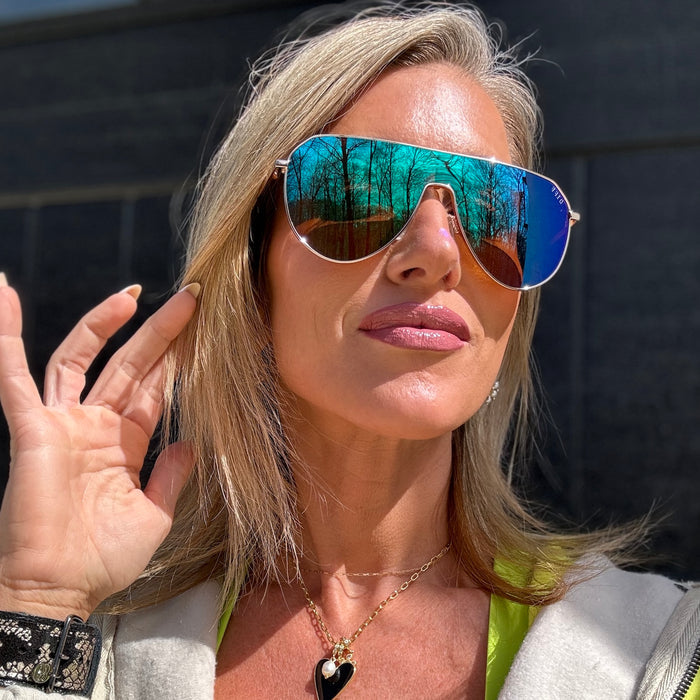 customer content - kalee rogers wearing dash shield sunglasses with a gold frame and green mirror lenses front view