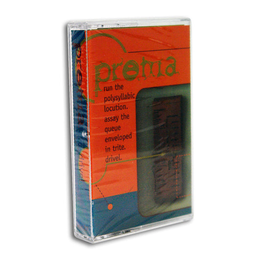 A sealed Prema audio cassette in a clear case with an orange and blue cover reading: “prema. run the polysyllabic locution…” Includes the Drivel Track List from Sounds Shapes Shades.