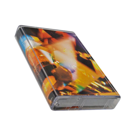 A colorful Pretty & Nice audio cassette tape in a clear plastic case, angled on a white background. The cover has an abstract, vibrant design with Stallion & Mare and Gold Fools in bold orange, yellow, and blue colors.