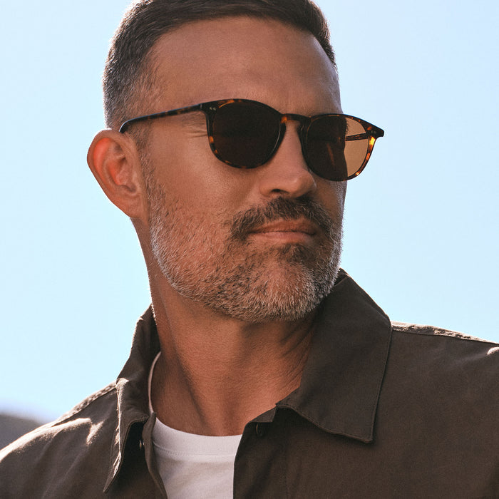 lifestyle - diff eyewear featuring the jaxson xl square oversized sunglasses with a rich tortoise frame and brown lenses angled view
