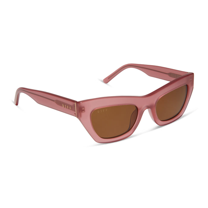 diff eyewear featuring the katarina cat eye sunglasses with a guava pink frame and brown lenses angled view