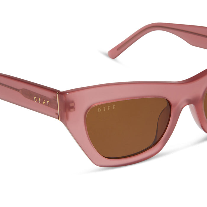 diff eyewear featuring the katarina cat eye sunglasses with a guava pink frame and brown lenses detailed view