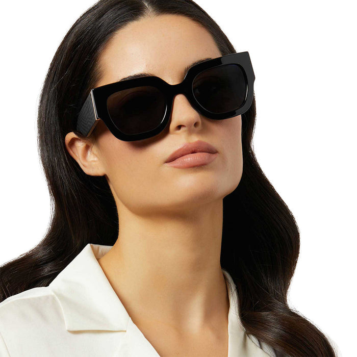 on model - female wearing iconica diff eyewear maren square oversized sunglasses with a black acetate frame and grey polarized lenses front view