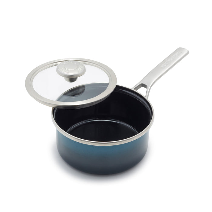The Merten  Storck 1.5-Quart Aegean Teal steel core saucepan with glass lid, handle, on a white background.