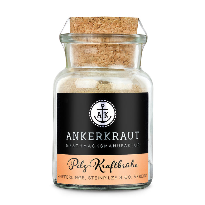 Pilzbrühe von Ankerkraut im Korkenglas auf weißem Hintergrund.