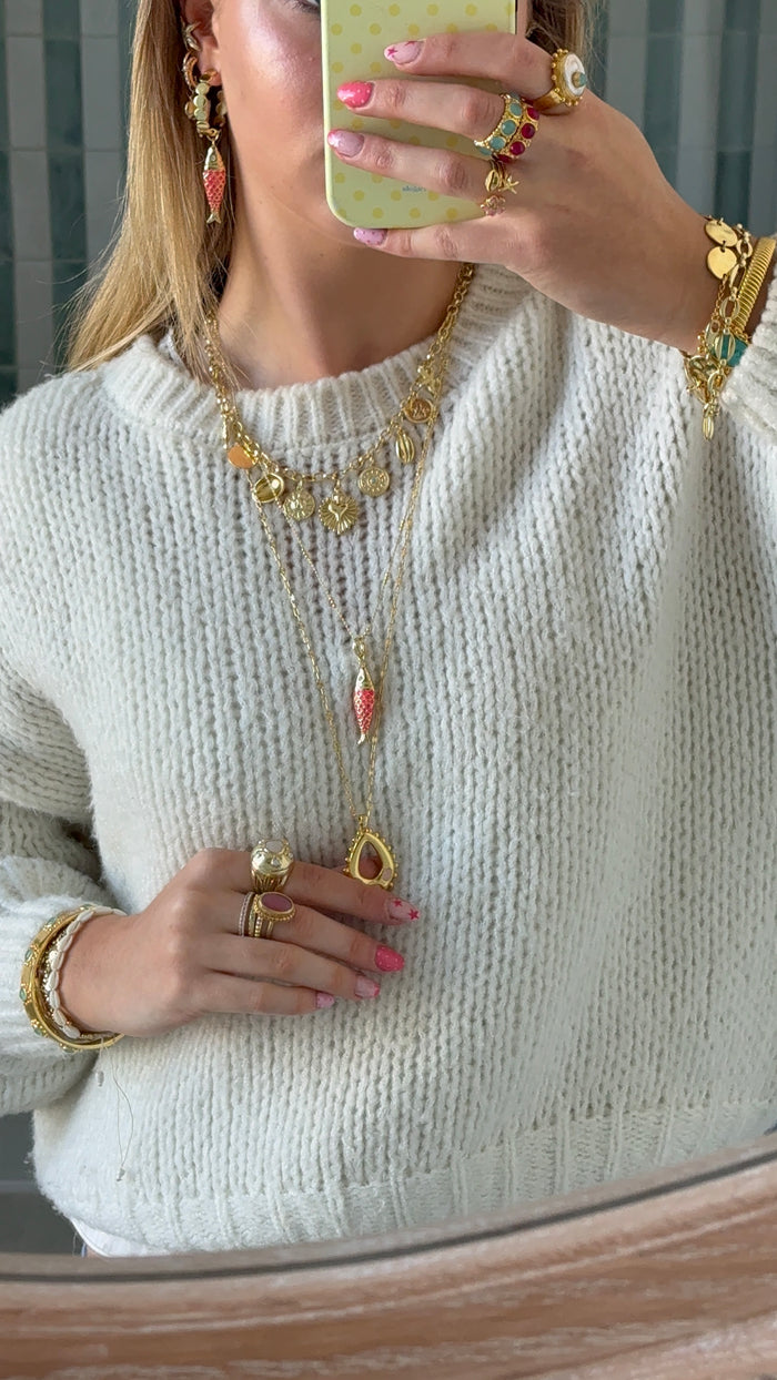 Layered gold jewellery pieces styled for stylish everyday look