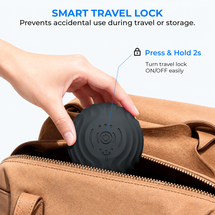 RECOVERO TRIGGER POINT ROLL placed in a tan handbag; travel lock turns on or off with a 2-second press