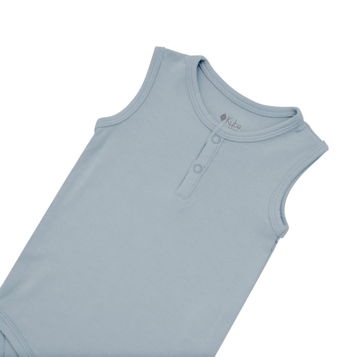 Close up of chest and neckline of Kyte Baby Sleeveless Bodysuit in Fog