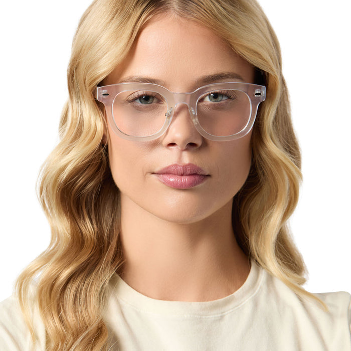 on model - female wearing diff eyewear featuring the summer square prescription glasses with a opalescent pink frame front view