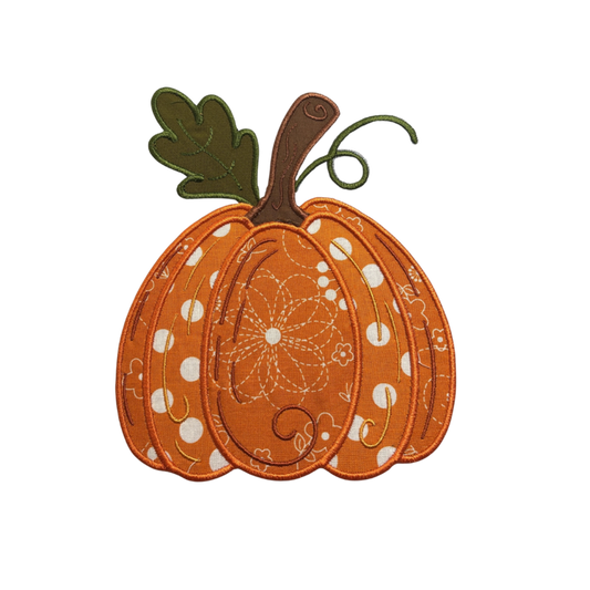 Decorative pumpkin with polka dot pattern on a white background