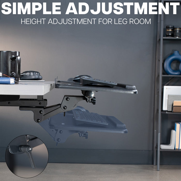 Adjustable keyboard tray with height adjustment mechanism in a room setting.