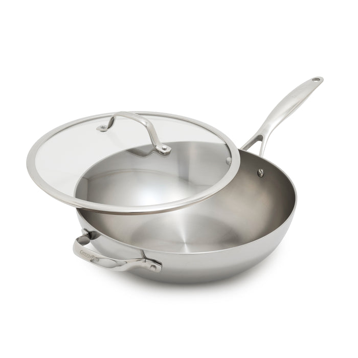 Stainless steel 12-inch wok with long handle and a glass lid, shown partially open.
