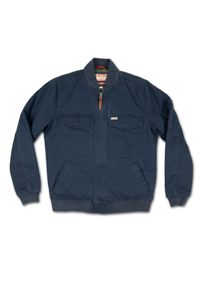 Navy blue jacket with a zip-up front, two chest pockets, and ribbed cuffs, displayed on a plain white background.