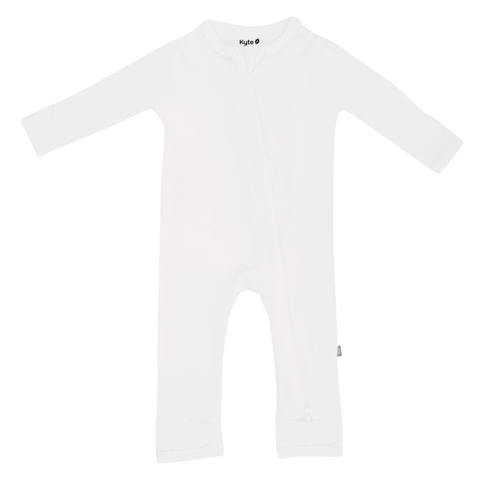 Flat lay of Kyte Baby Zippered Romper in Cloud