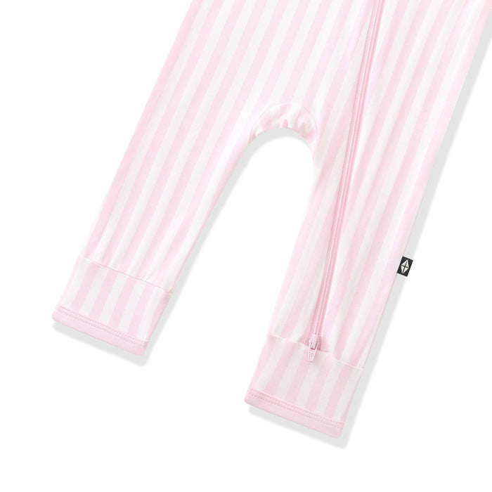 Zipper closure shown on the leg of the Zippered Romper in Small Sakura Stripe