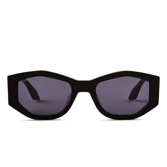 diff eyewear zoe oval sunglasses with a black frame and grey polarized lenses front view